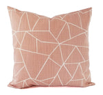 A blush pink pillow with white geometric lines.