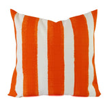 A white and orange striped pillow.