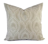 A grey taupe trellis geometric pattern pillow.